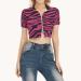 Zip-up crop top with red zebra stripes, short sleeves and zip collar, unzipped